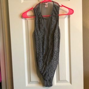 Victoria Secret Body Suit. Worn as top